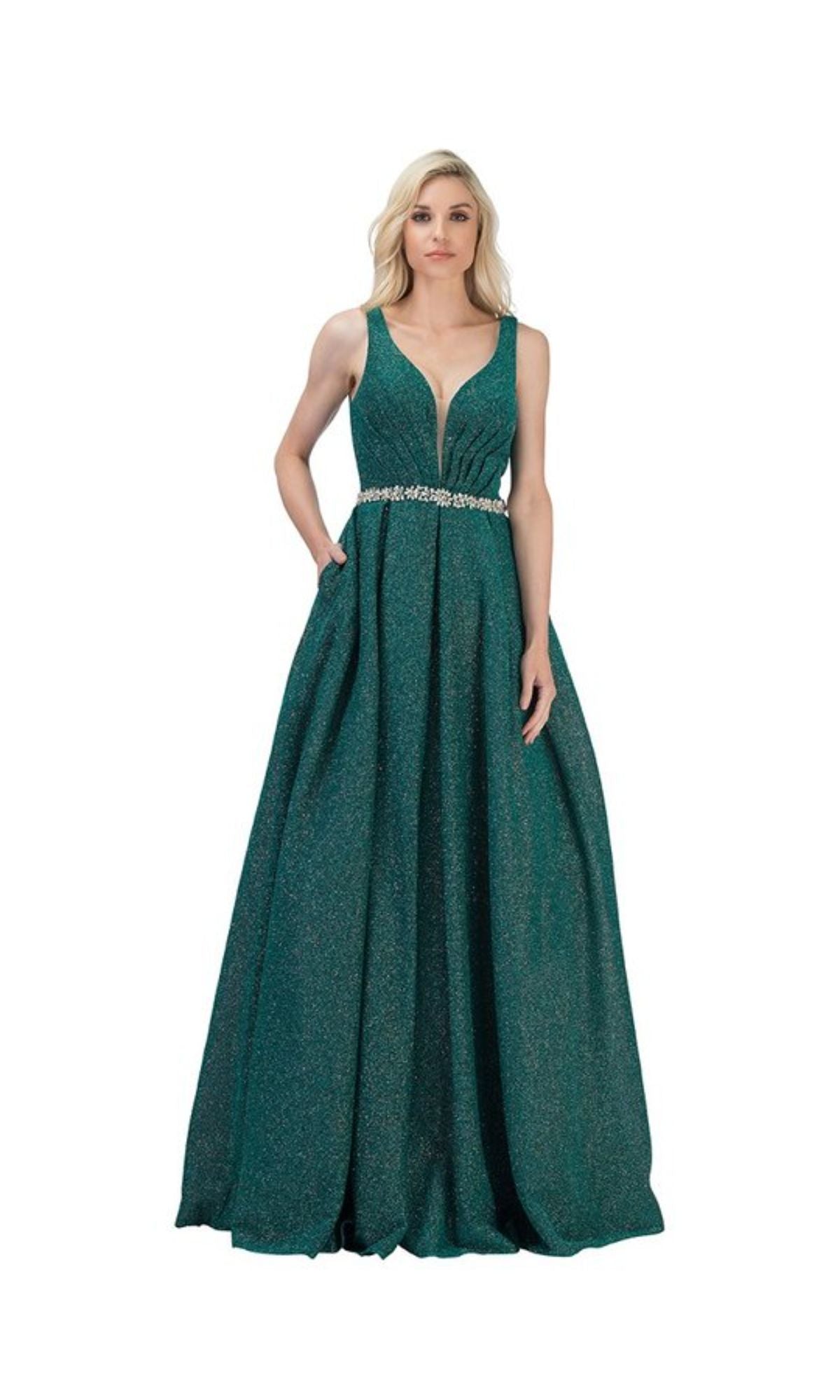 A woman wears the Bead-Waist Long Glitter Prom Dress: Chicas BT9027, a sleeveless emerald green gown with a V-neckline and jeweled waistband, standing against a white background.